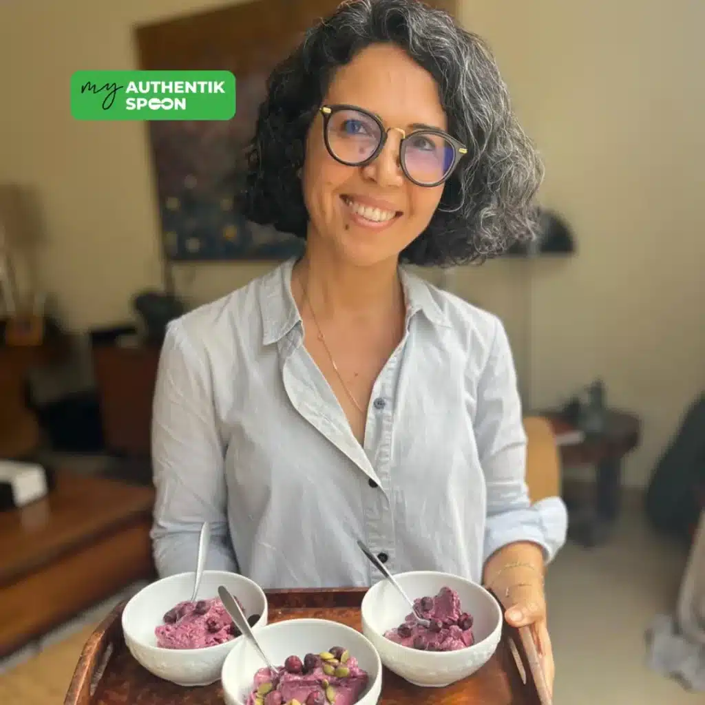 Asmaa Lahlou serving berry pudding a hormone-balancing dessert for Pink October