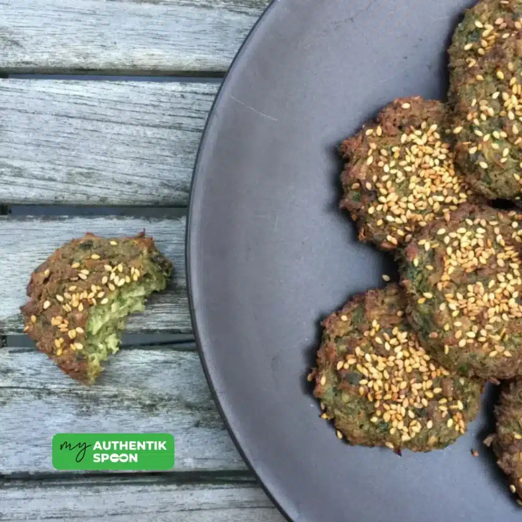 baked falafel fresh out of the oven with sesame topping