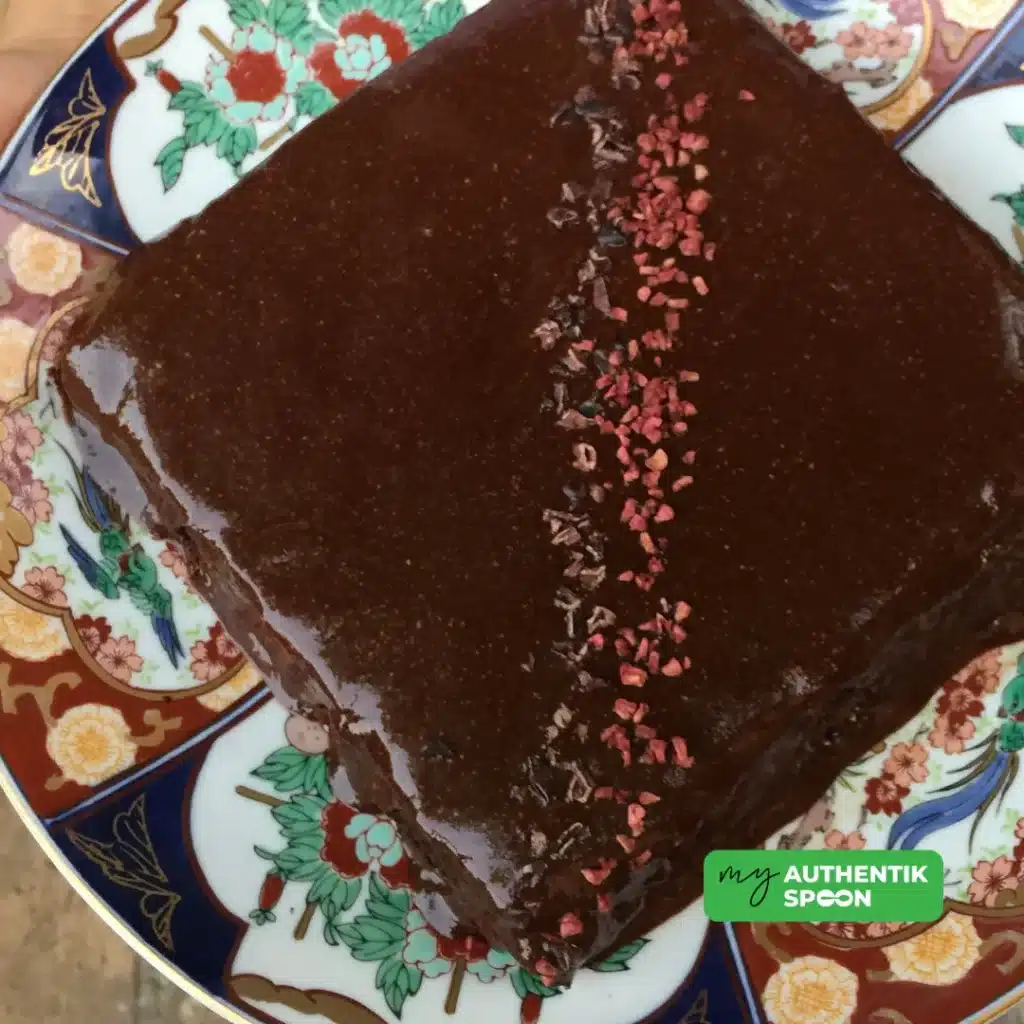 indulgent homemade chocolate brownies with cacao glaze and superfood toppings
