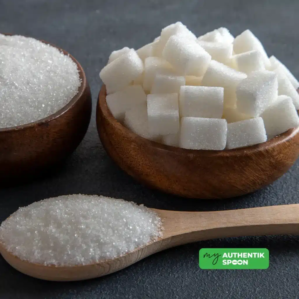 Refined sugar cubes and granulated sugar compared to healthy sweeteners for better blood sugar balance.