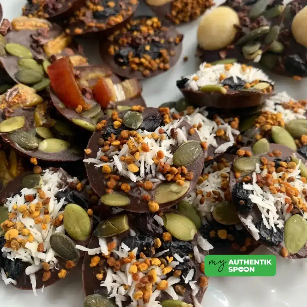 Healthy chocolate bites with coconut, seeds and berries for anti-inflammatory snacking