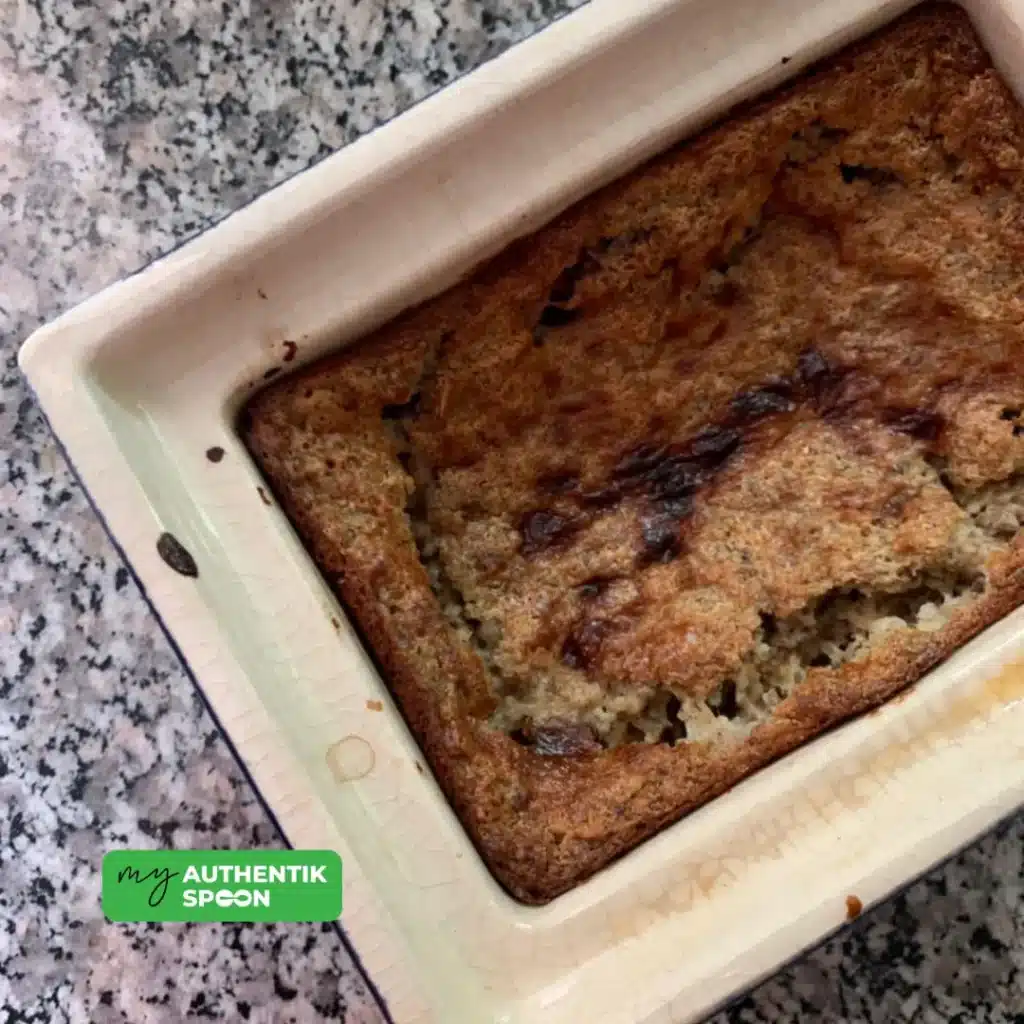 Healthy high protein baked oats for stable energy in a baking dish, a high protein high fiber breakfast for stable energy, gut health, and weight loss
