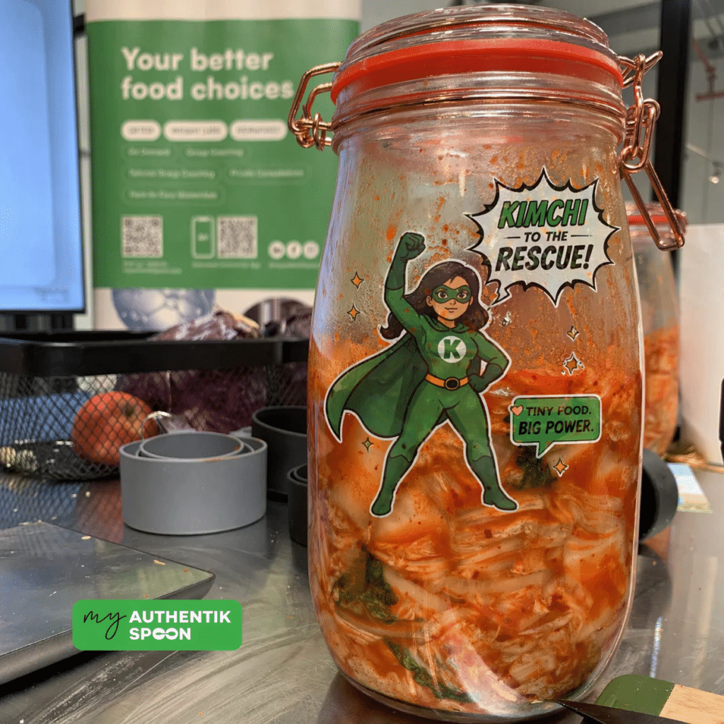 Fermented foods for sugar cravings shown as a jar of homemade kimchi on a kitchen counter, supporting gut health, digestion, and energy.