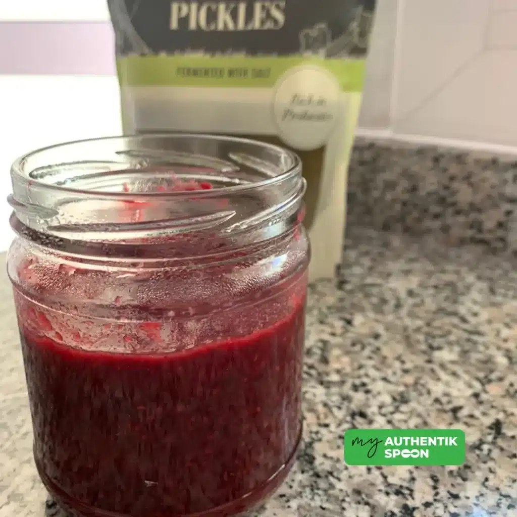Homemade lacto-fermented berries jam in glass jar supporting gut health and metabolic balance